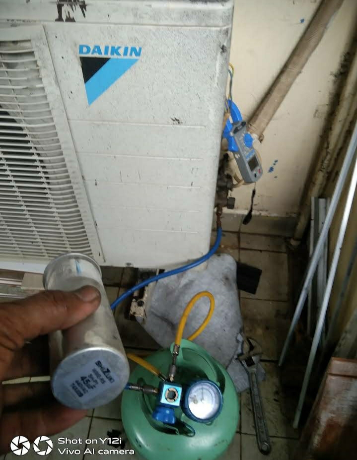 Perbaikan dan isi freon
